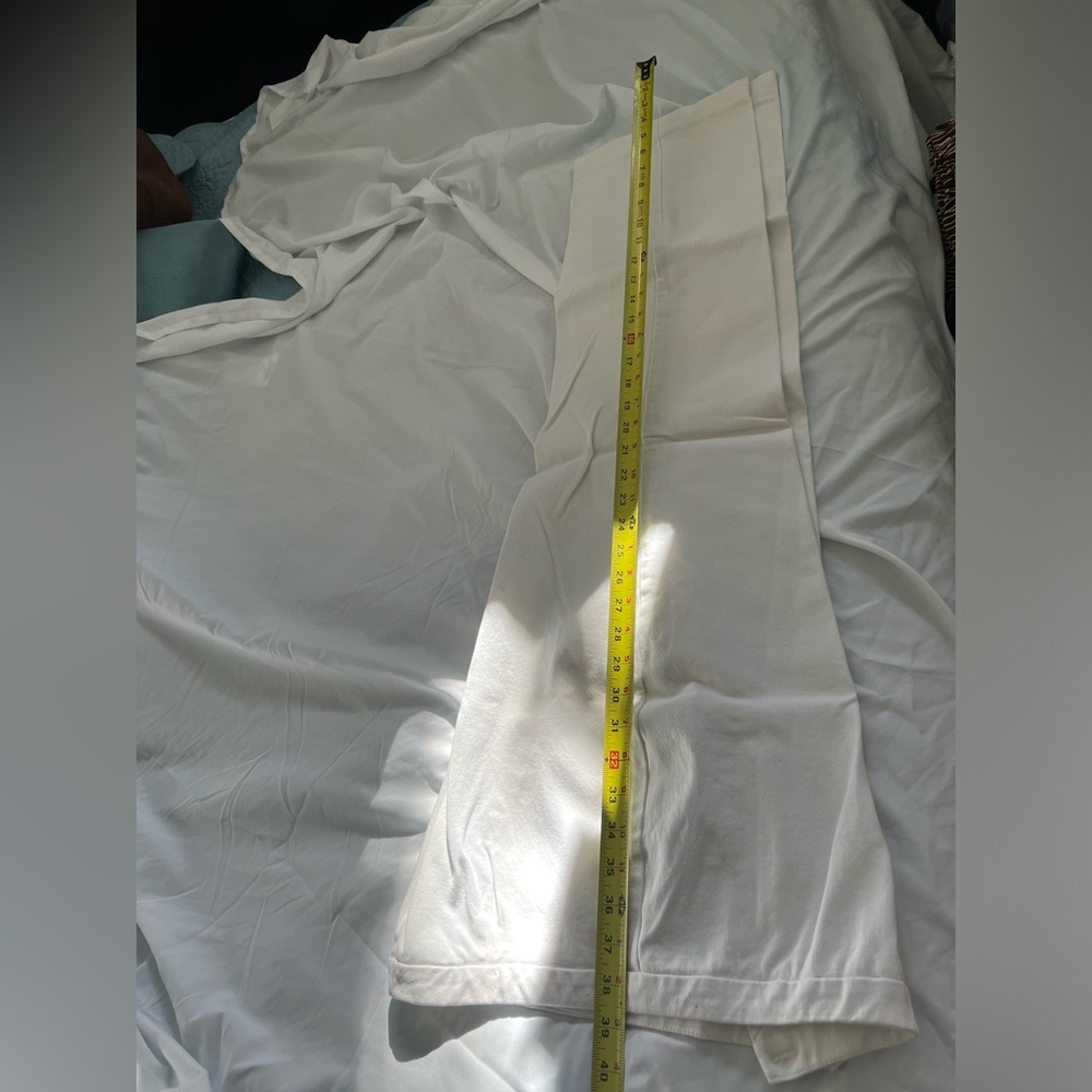 Chicos size 2 beige slacks with zipper and button.K.